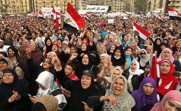 Anti-Mursi protesters chant anti-government slogans in Tahrir Square in Cairo