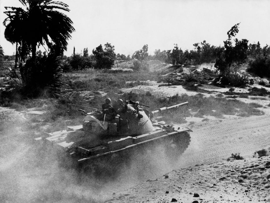 After crossing the Suez Canal, Israeli tanks advance into Egyptian territory