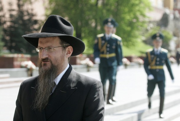 Russia's Chief Rabbi Berl Lazar takes part in a wreath laying ceremony at the Tomb of the Unknown Soldier in central Moscow