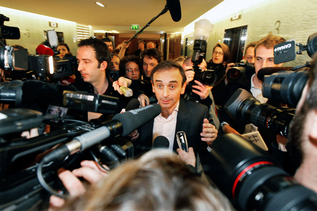 French journalist Eric Zemmour leaves after delivering a speech at UMP political party's conference at the National Assembly in Paris