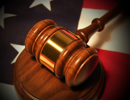 Gavel and flag from Dreamstime.com.  Used for Social Security package. Justice Judge legal system.