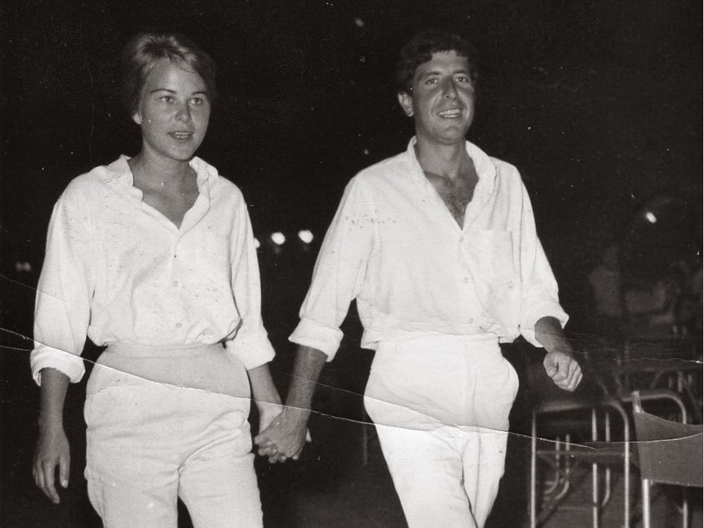 Marianne Ihlen strolling with Leonard Cohen at the port, Hydra, 1963. From So Long, Marianne: A Love Story. Credit: ECW Press