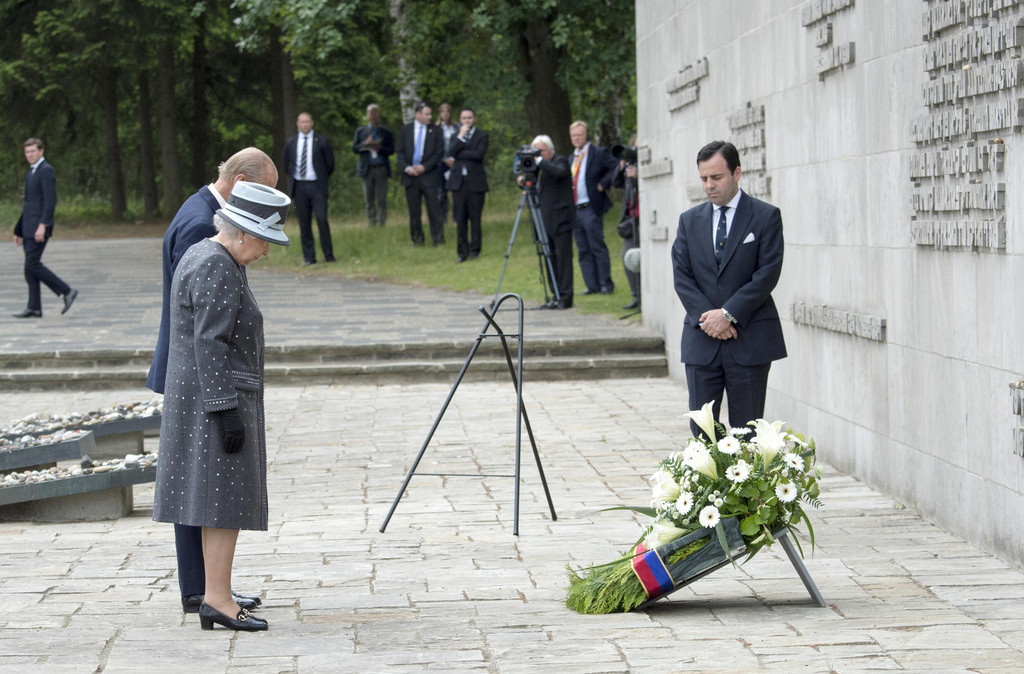The Queen and The Duke of Edinburgh visited the Bergen-Belsen memorial site. The Queen and The Duke of Edinburgh viewed the grave of Anne Frank and  laid a wreath at the inscription wall.They then met 2 survivors of the camp and 2 liberators   Picture: Arthur Edwards